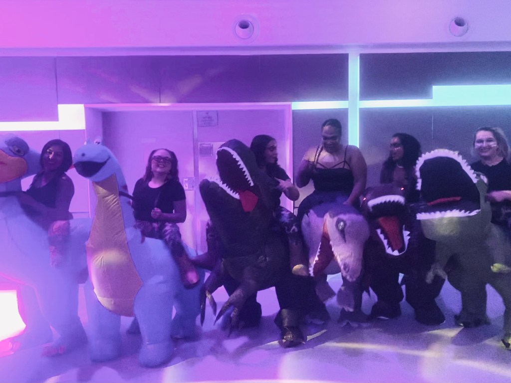 Inflatable dinosaur halloween group costume on a disney cruise