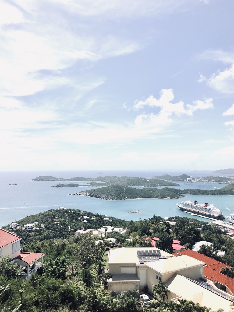 View of St Thomas from Paradise Point observation deck. Ocean, islands and ship in the distance.