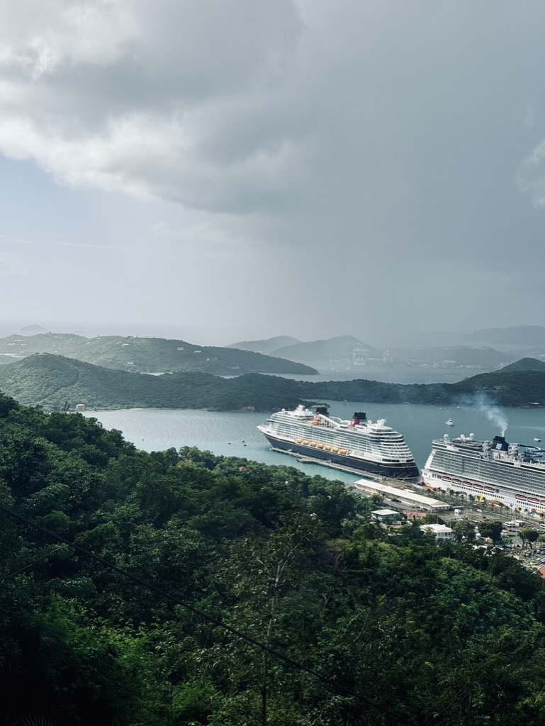 View of St Thomas from Paradise Point observation deck. Ocean, islands and ship in the distance.