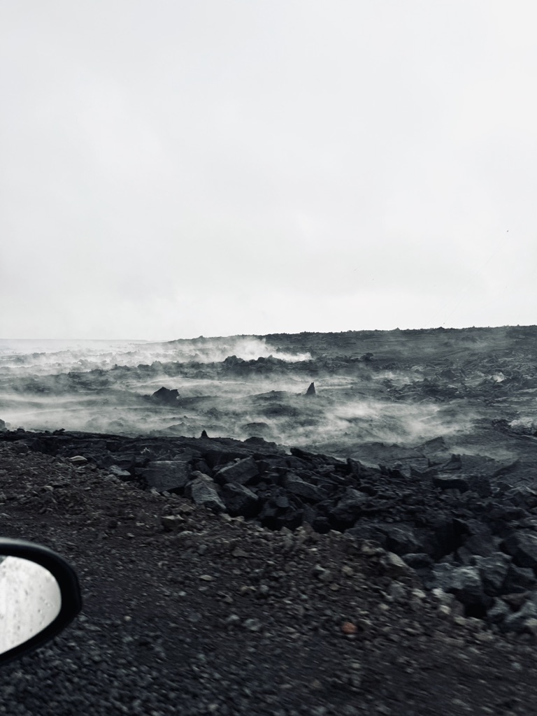 Steaming lava next to road from recent volcano eruption close to Blue Lagoon in Iceland