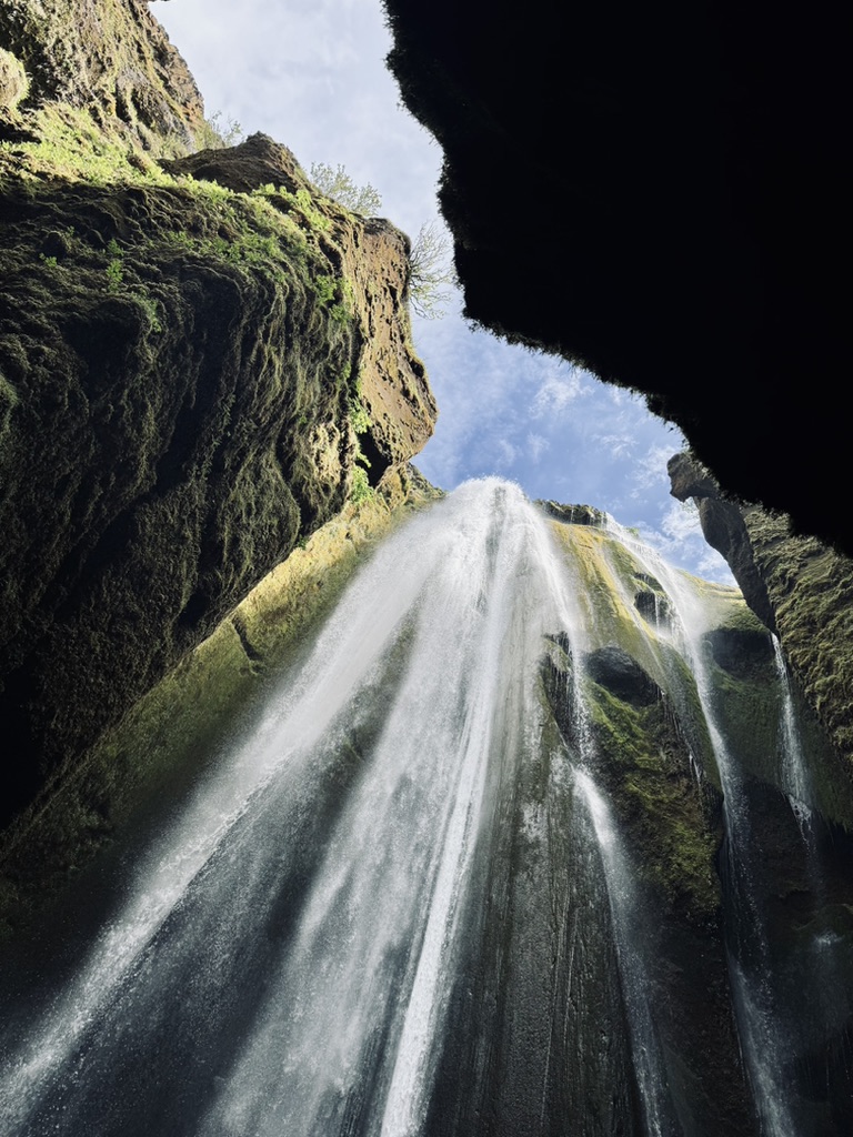 Gljufrabui aterfall from below in cave, Iceland