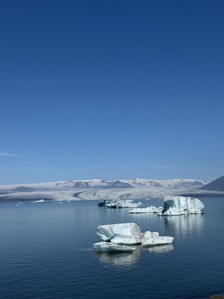 Icebergs floating on the blue waters of Jökulsárlón Glacier Lagoon, Iceland