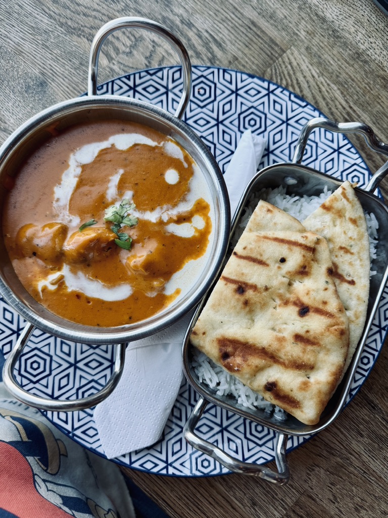 Butter Chicken in stylish plates at a restaurant in Reykjavik, Iceland
