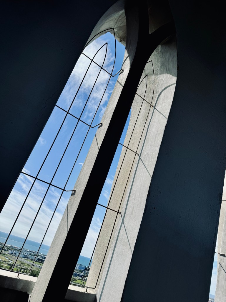 Tall windows with view of Reykjavik from Hallgrimskirkja church in Reykjavik, Iceland