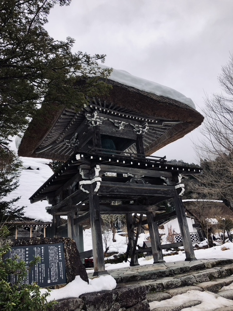 Traditional Temple covered in snow in Shirakawago Village, Japan