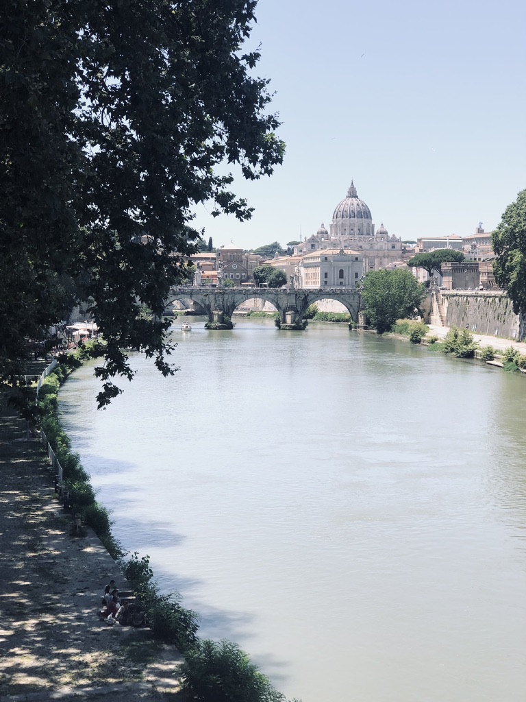 View of Sistine Chapel from a distance over canal and bridges
