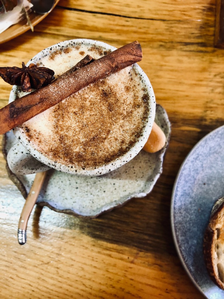 Chai latte in cute clay cup in Grindelwald, Tasmania