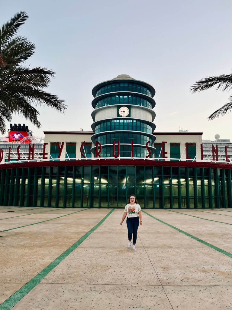 Girl walking outside Disney Cruise Line cruise terminal at Port Canaveral