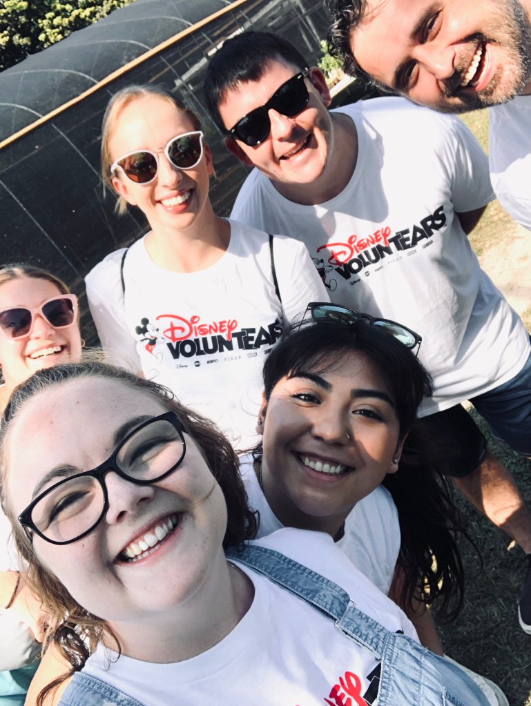 Disney crew members participating in voluntears event in nassau, bahamas