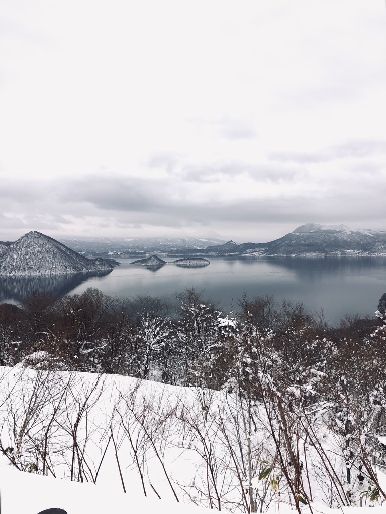 View of lake with snow in winter Hokkaido, Japan