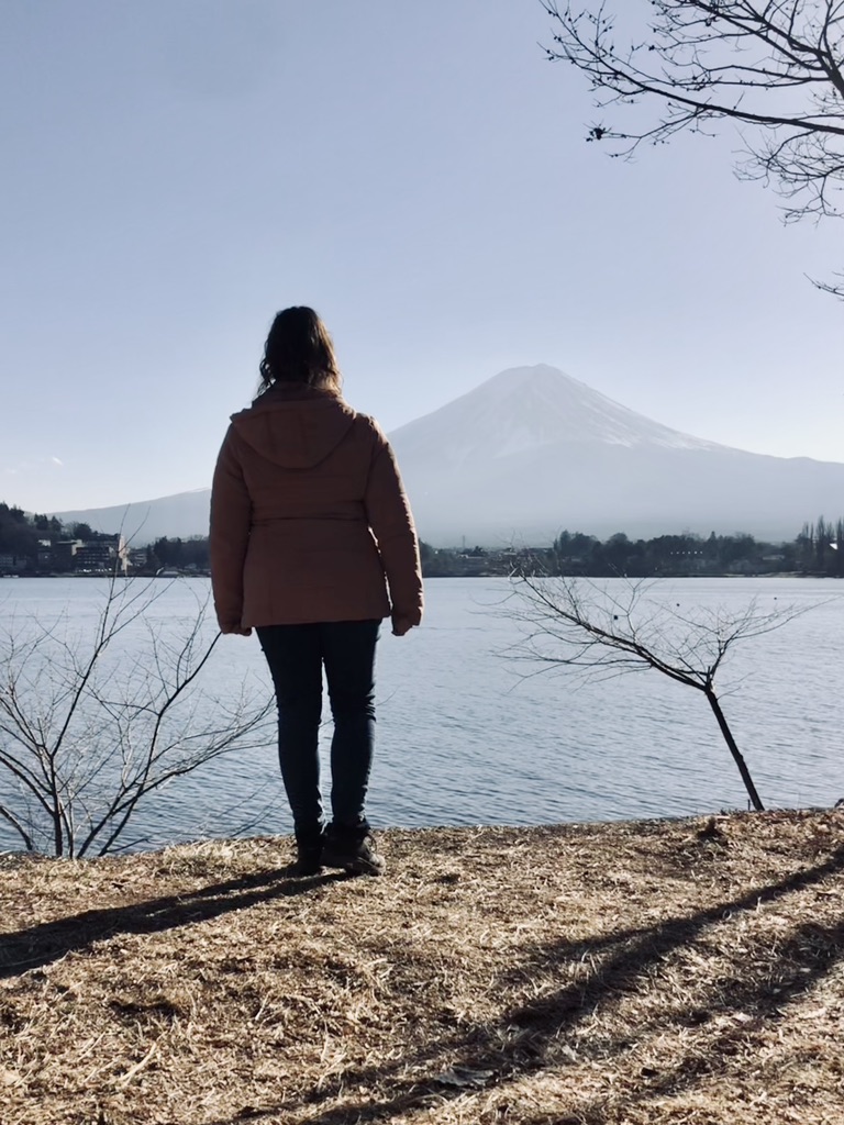 Girl looking at view of Mt Fuji from kawaguchiko, Japan