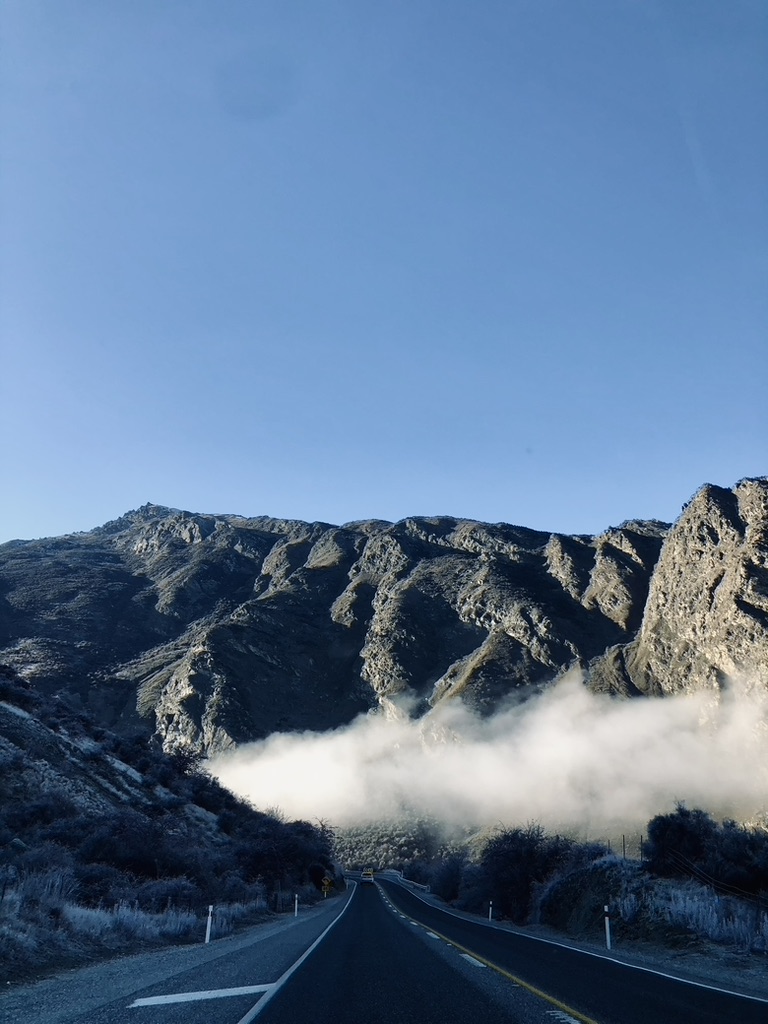 Foggy mountains on road trip in New Zealand's South Island