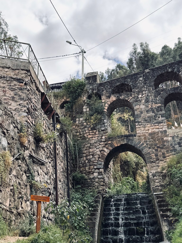 Old aquaduct ruins in San Blas neighbourhood in Cusco, Peru