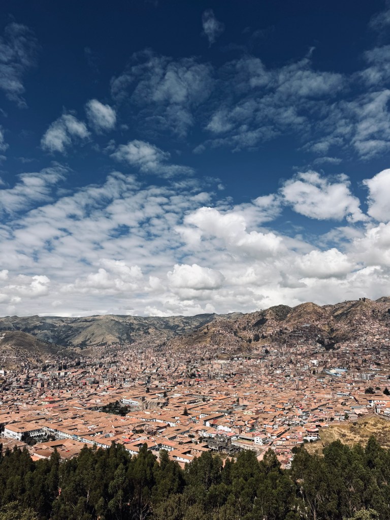 View of Cusco city on a sunny day from Cristo Blanco viewpoint in Peru