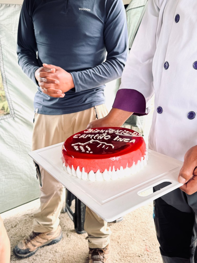 Chef holding jelly cake on the Inca Trail in Peru