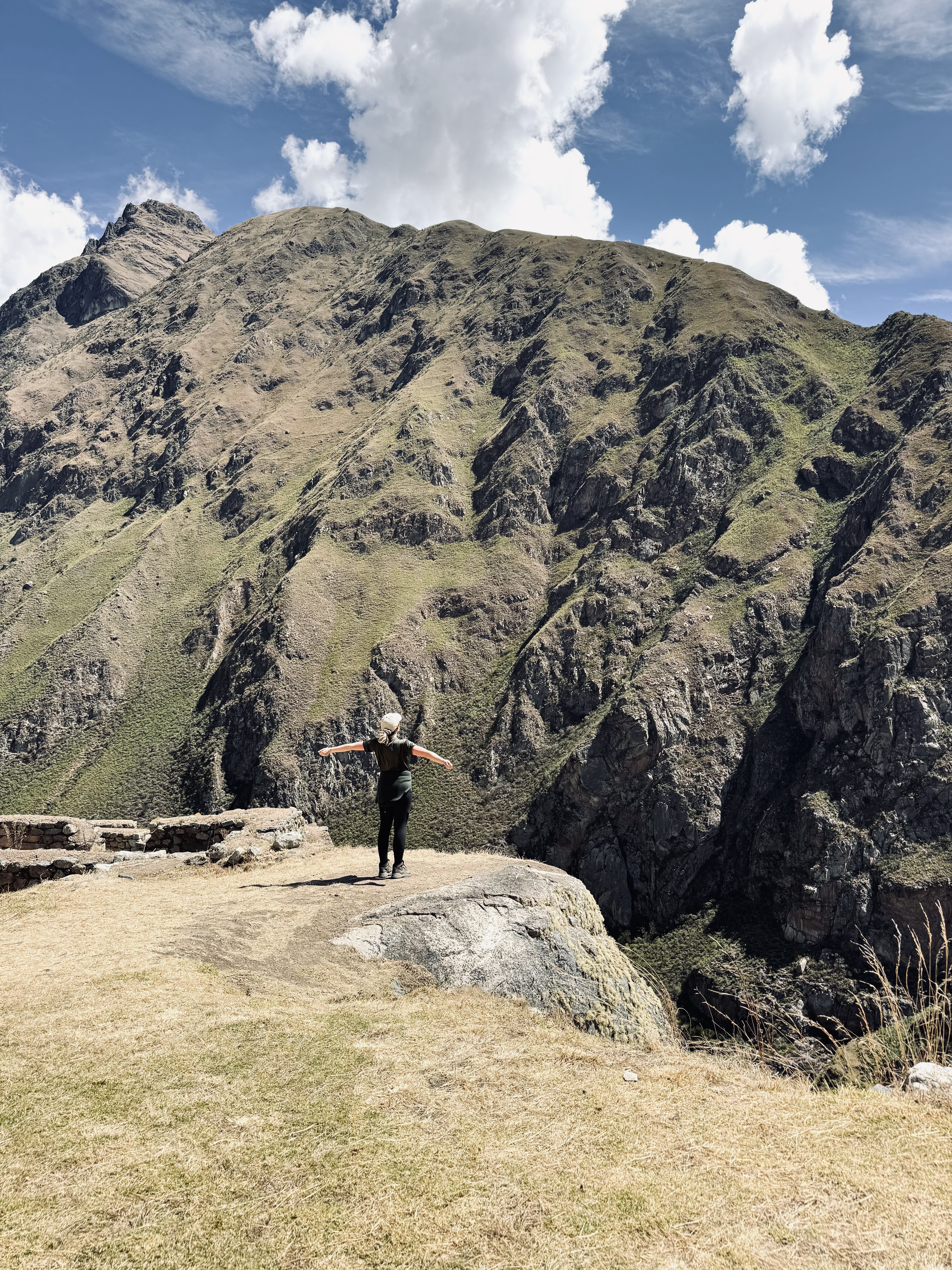 Girl looking out at mountain views on the Inca Trail, Peru