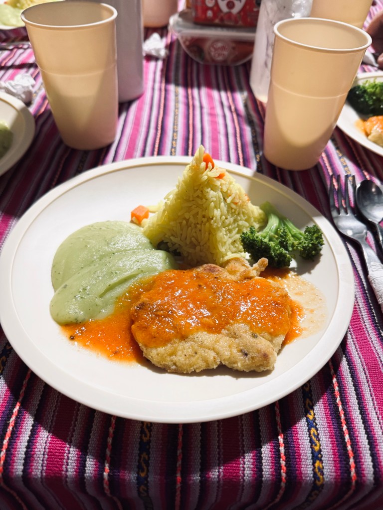 Dinner of chicken and rice on the Inca Trail, Peru