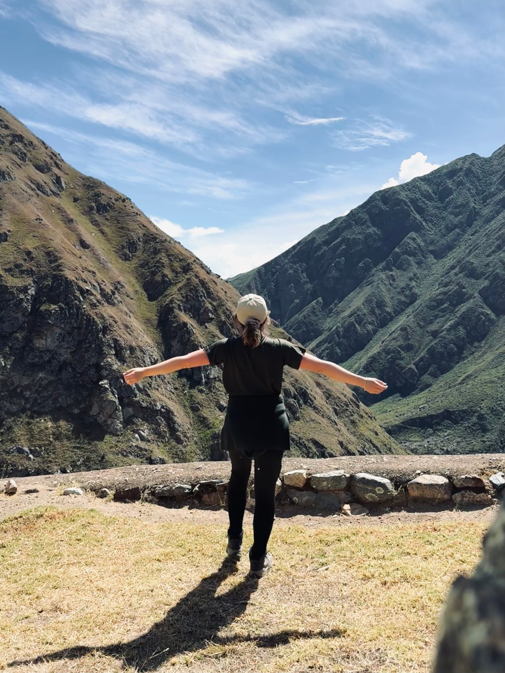 Girl looking out at mountains along the Inca Trail, Peru