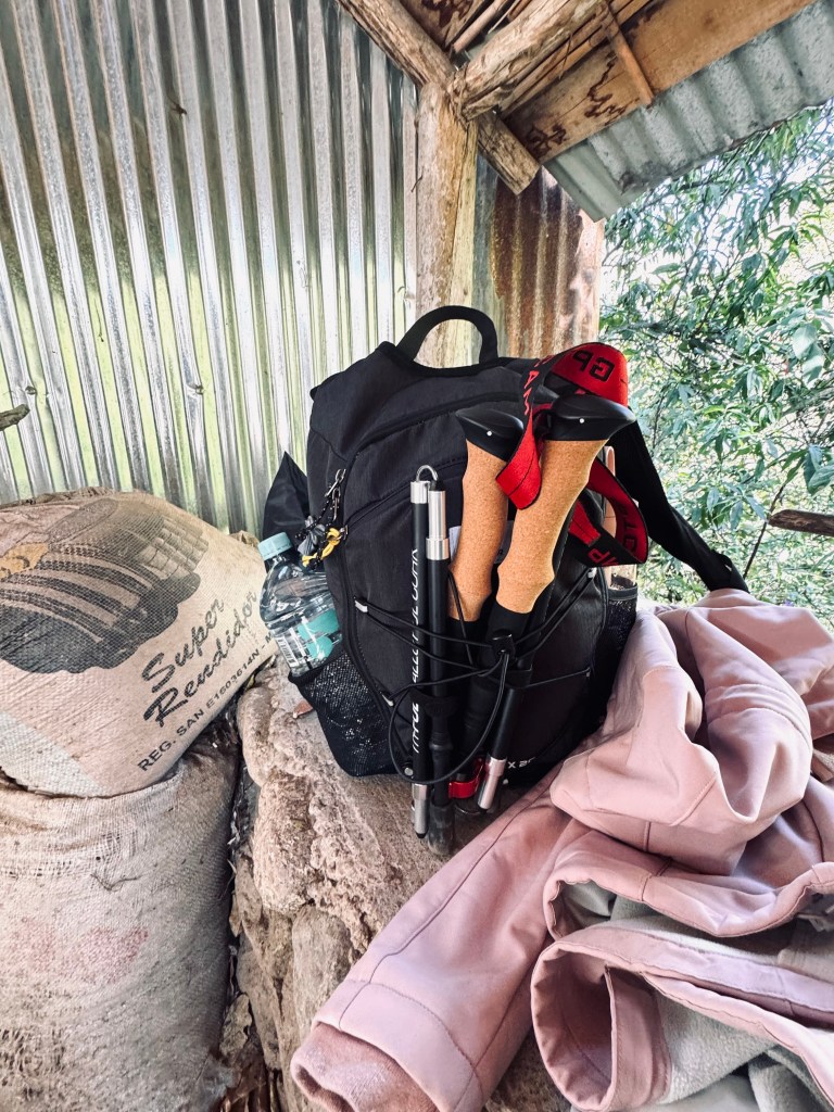 Day pack with water bottles, trekking poles and jacket on the Inca Trail in Peru