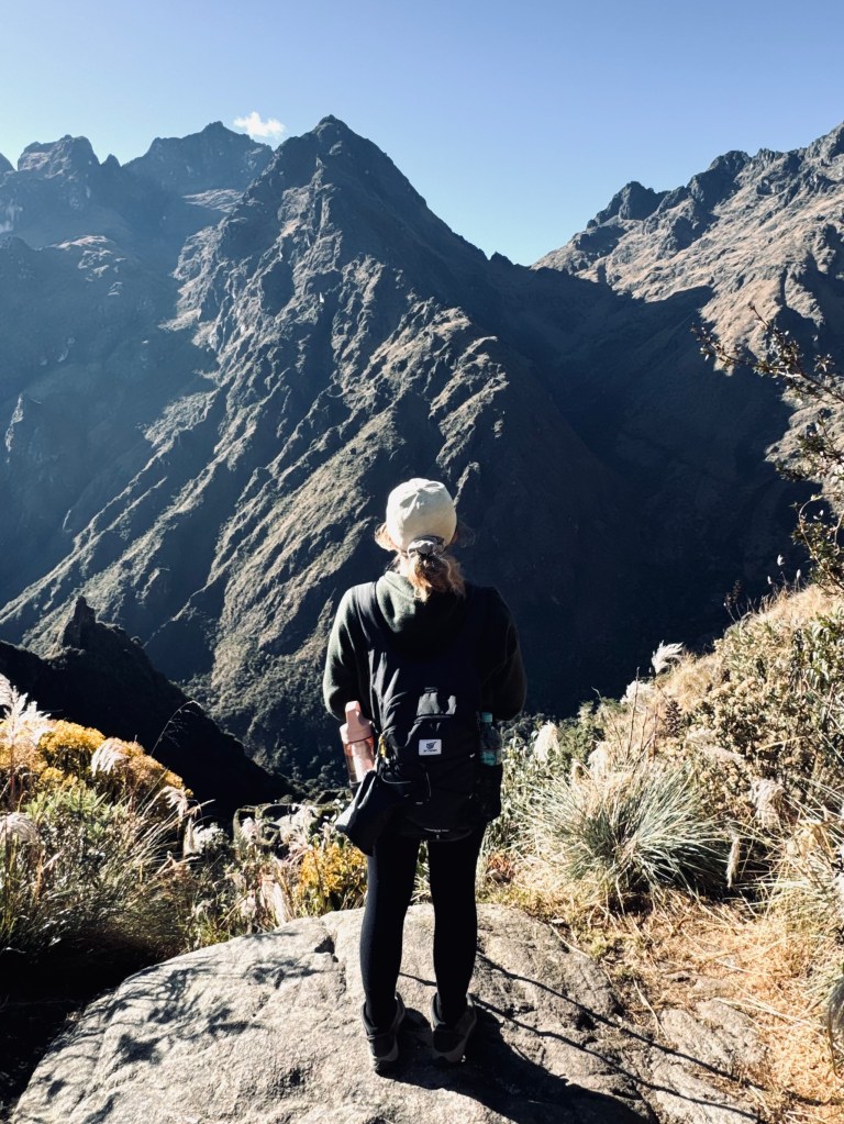 Girl looking out at mountains on the Inca Trail in Peru