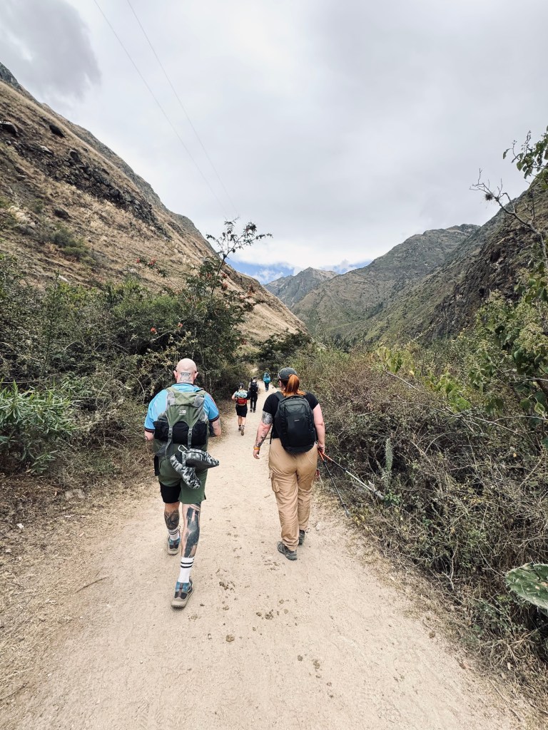 Group hiking on a path on the Inca Trail, Peru