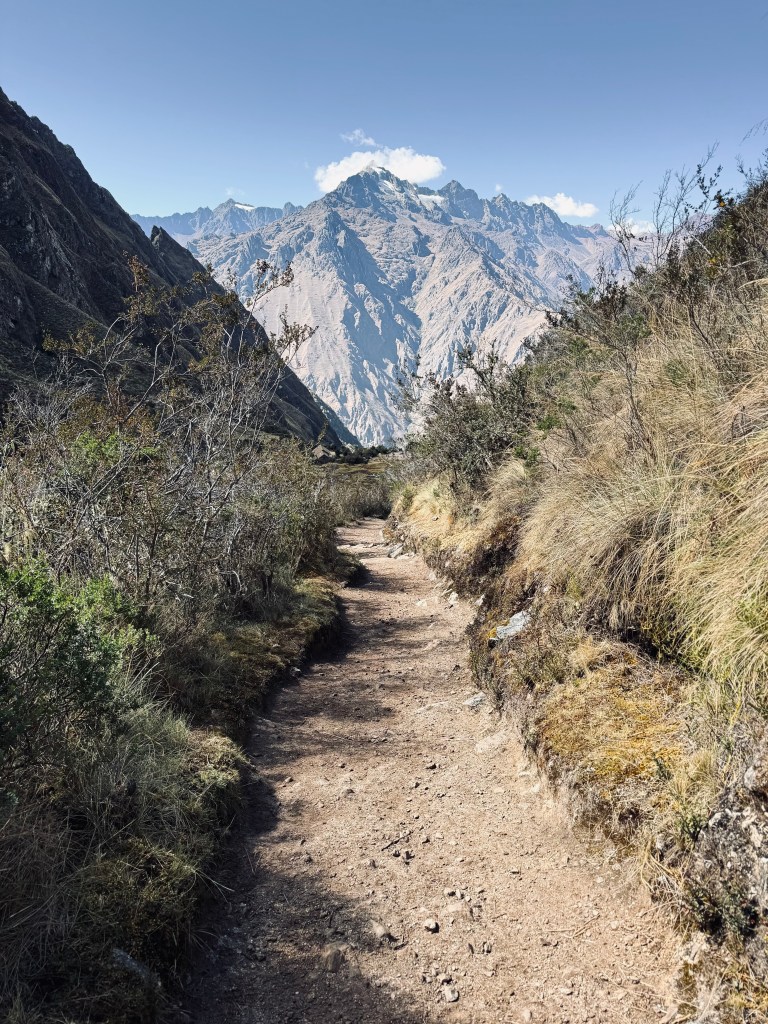 Dirt track with mountains in the distance on the Inca Trail in Peru