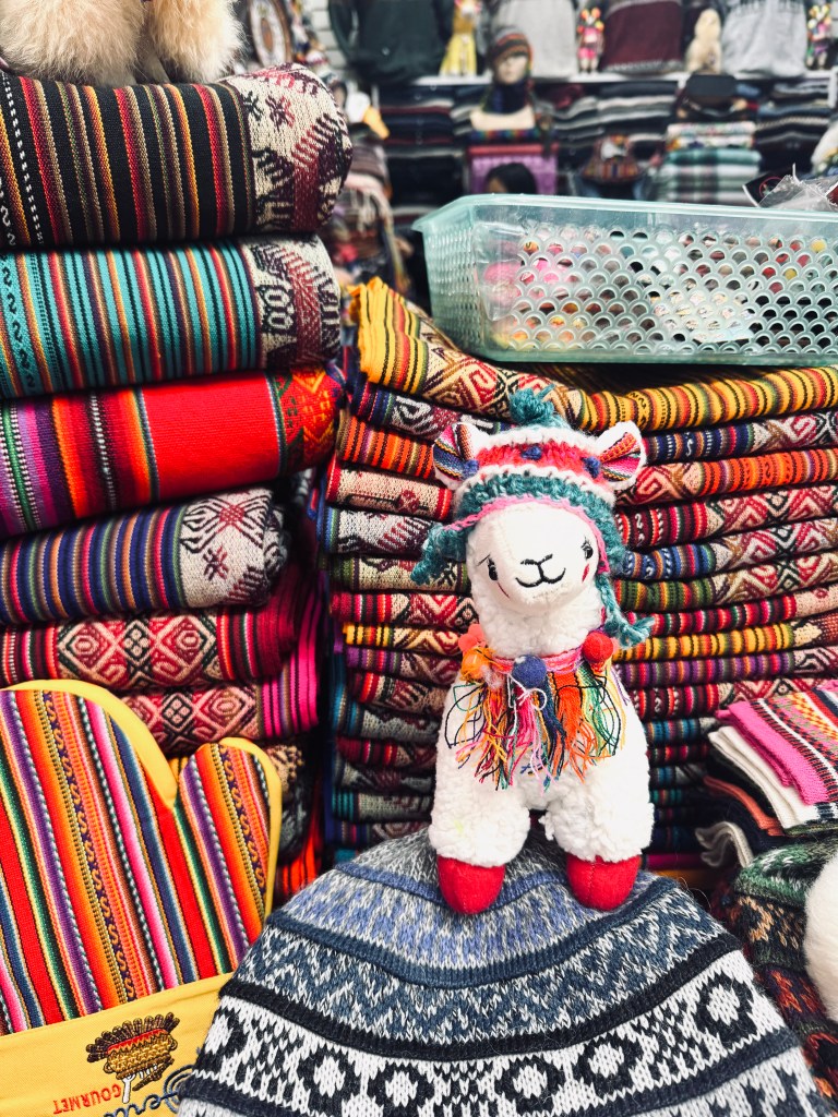 Cute plush llama in a market stall in Miraflores, Lima, Peru