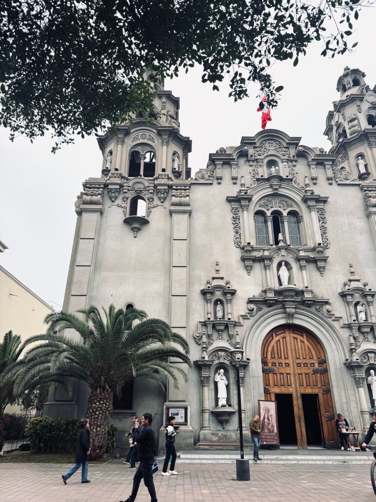 Grey church in the park in Miraflores, Lima, Peru