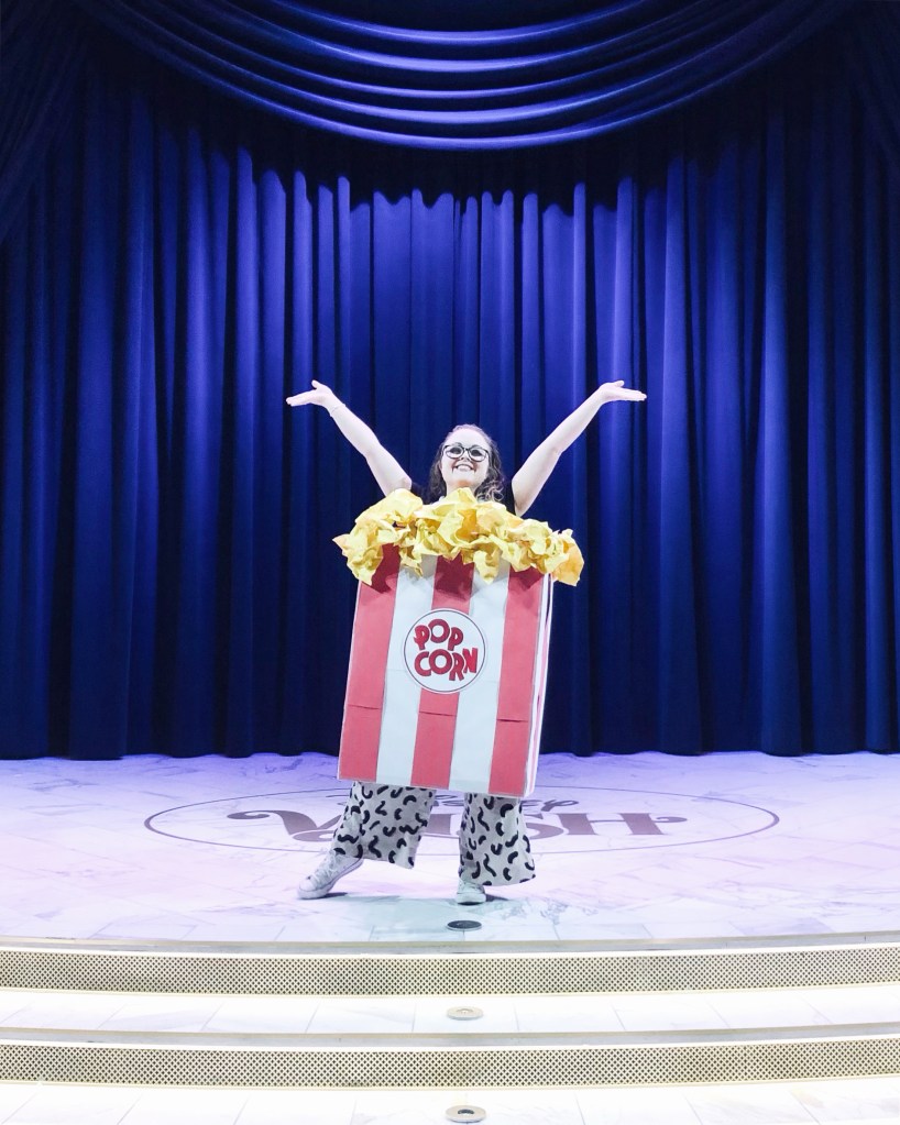 Girl dressed up as popcorn onboard a disney cruise ship