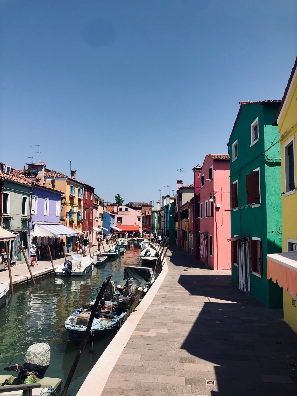 Colorful buildings and a canal on Burano Island in Venice, Italy