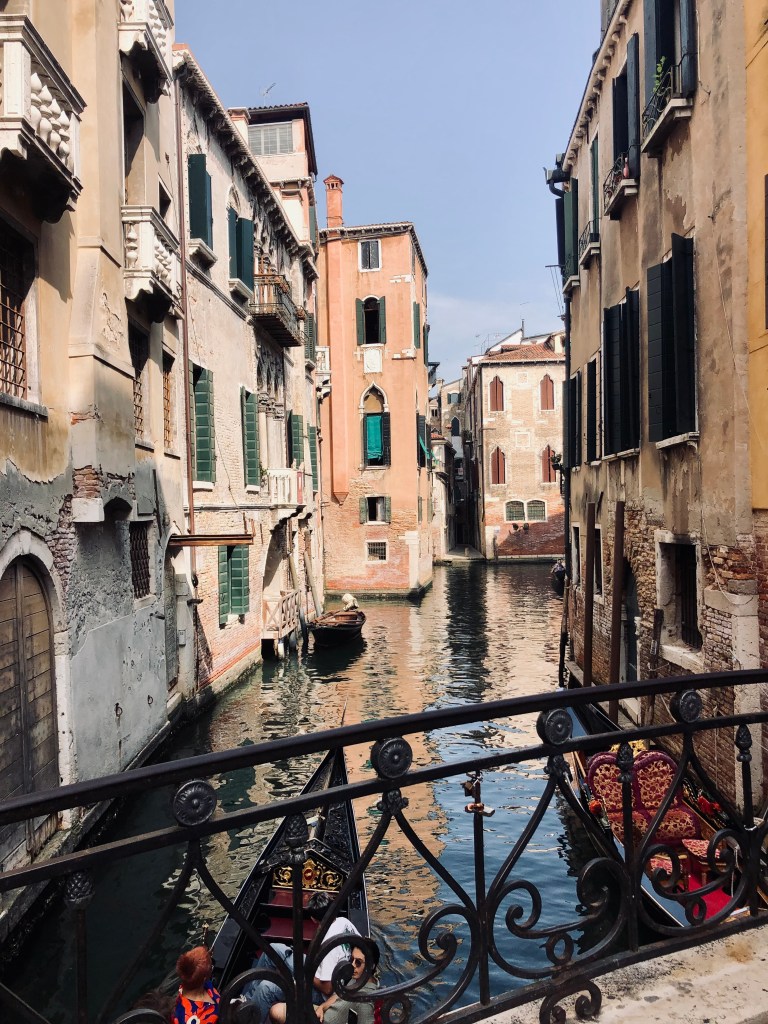 Beautiful canal and old buildings in Venice, Italy