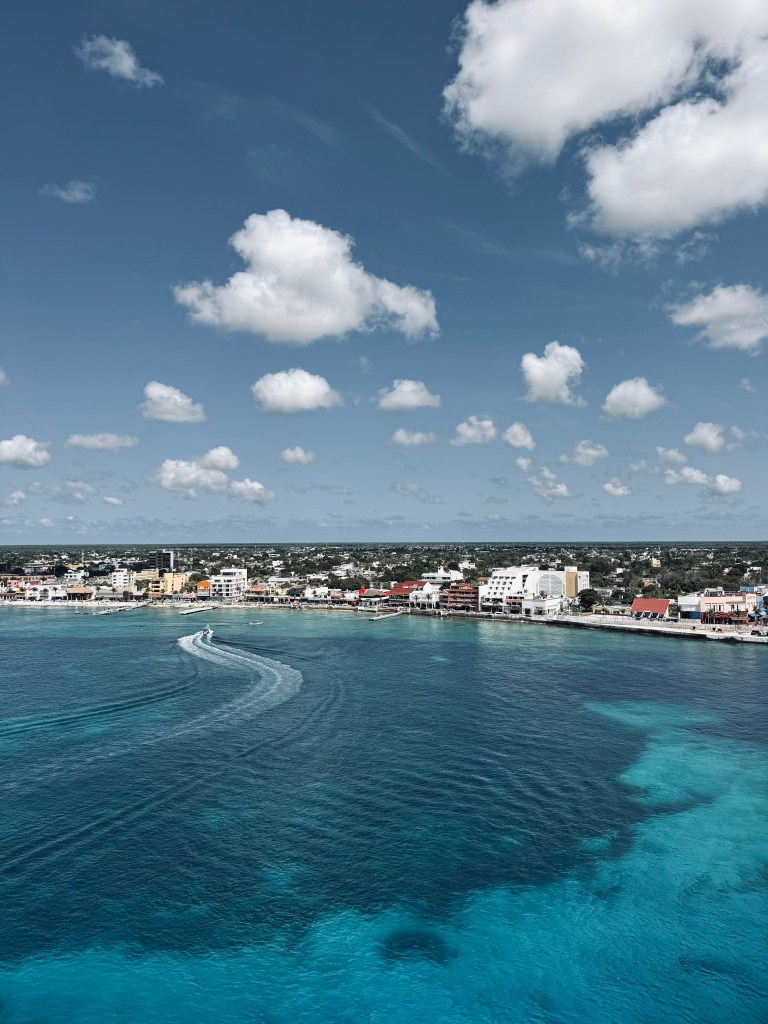Aqua blue water and view of town at Cozumel, Mexico