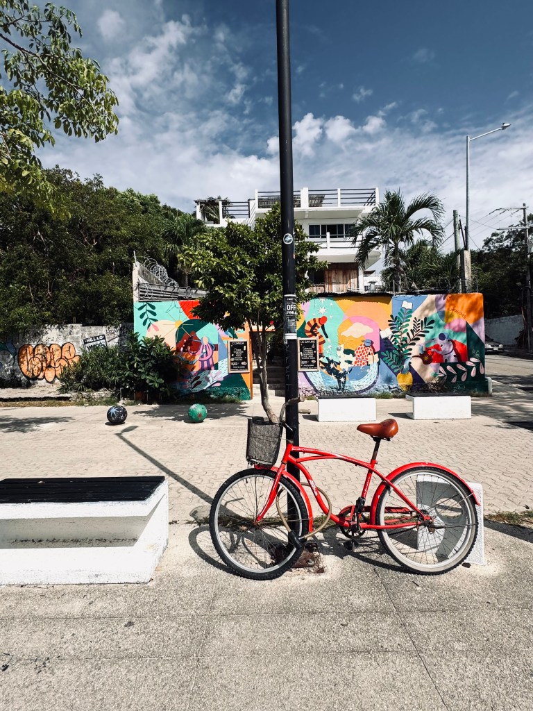 Bike with street art along Quinta Avenida at Playa del Carmen in Mexico