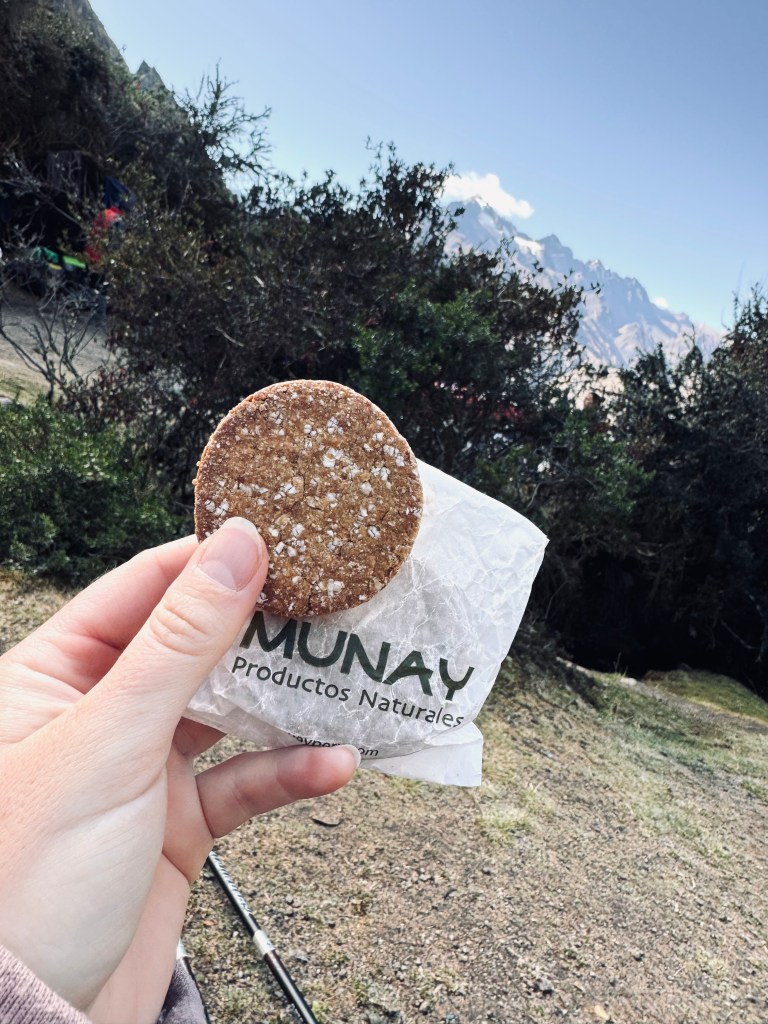 Hand holding healthy biscuit on the Inca Trail, Peru