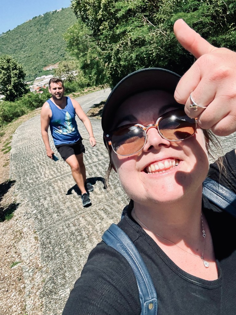Two friends taking a selfie while climbing hill in st thomas, virgin islands
