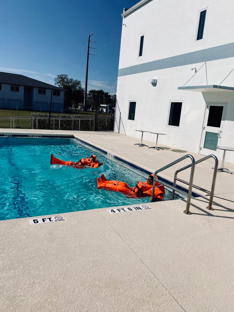 Disney crew members in immersion suits during wet drill