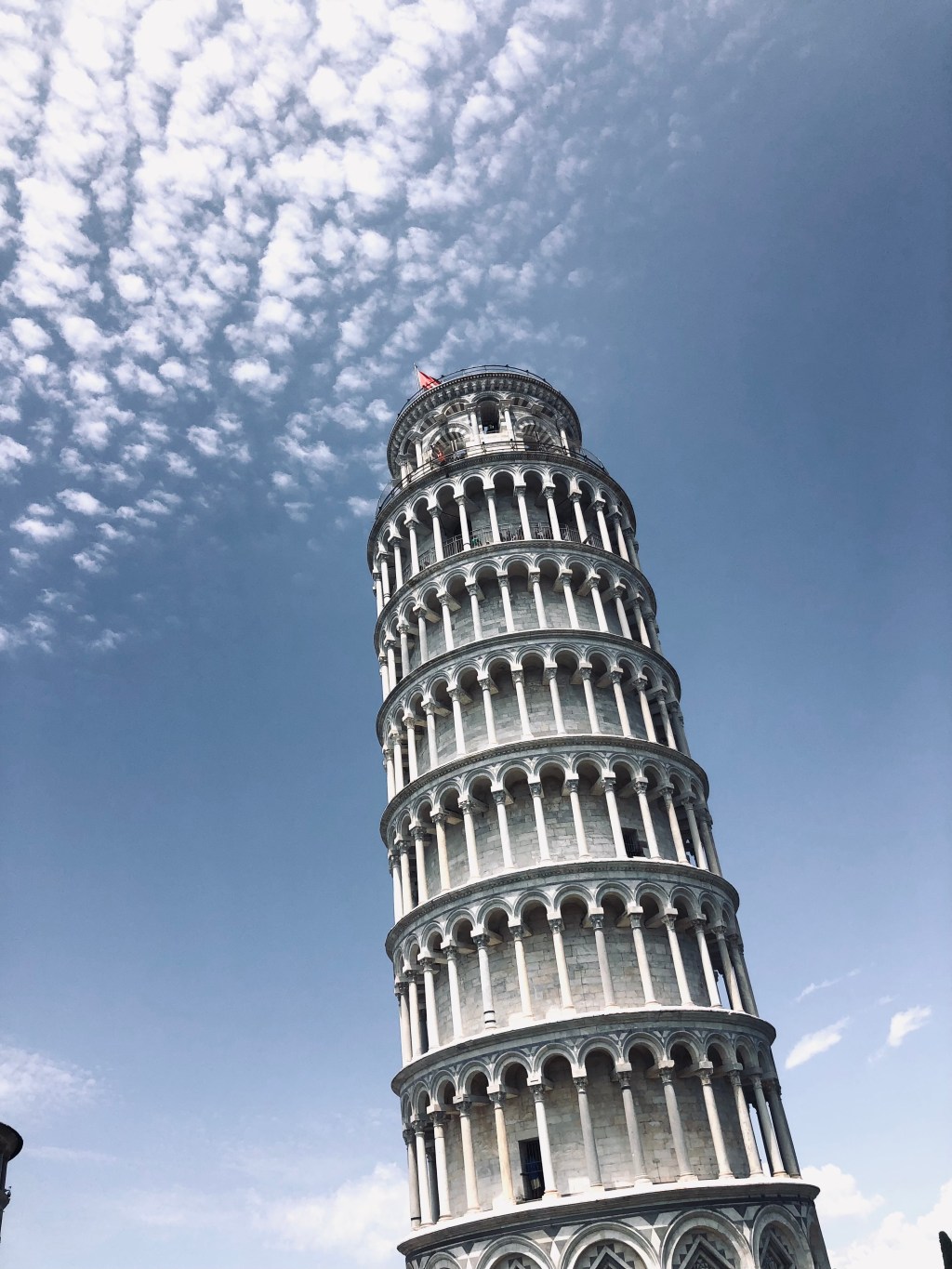Leaning tower of Pisa in Italy on a blue sunny day