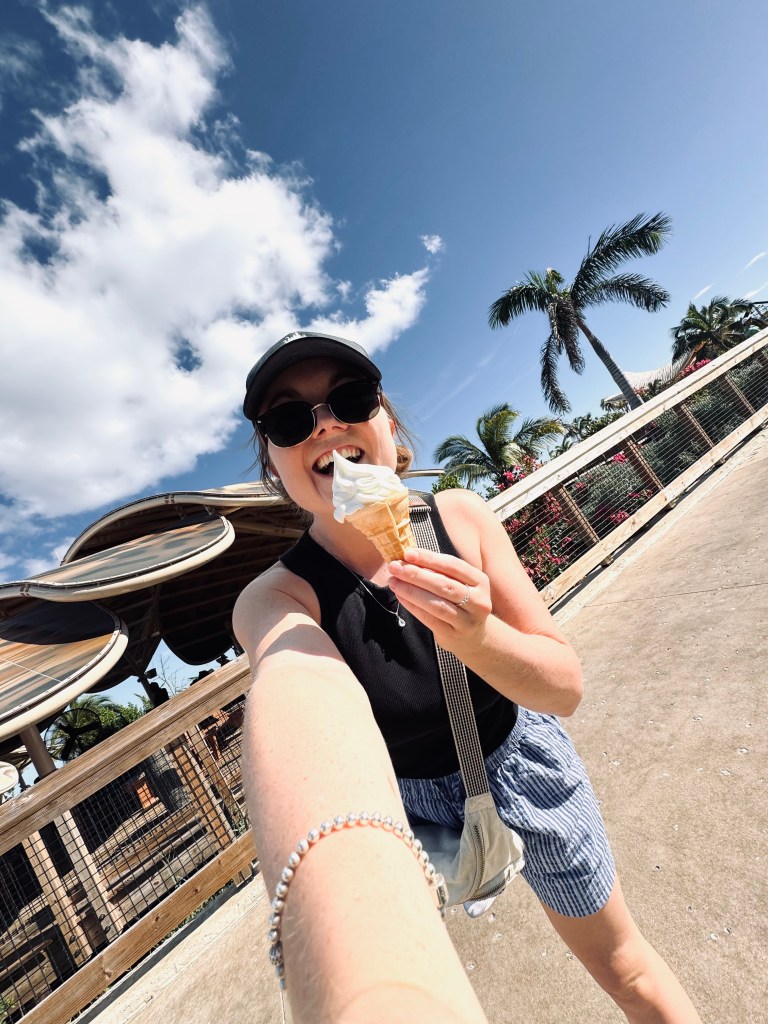 Girl with soft serve ice cream at Disney Lookout Cay at Lighthouse point in the Bahamas
