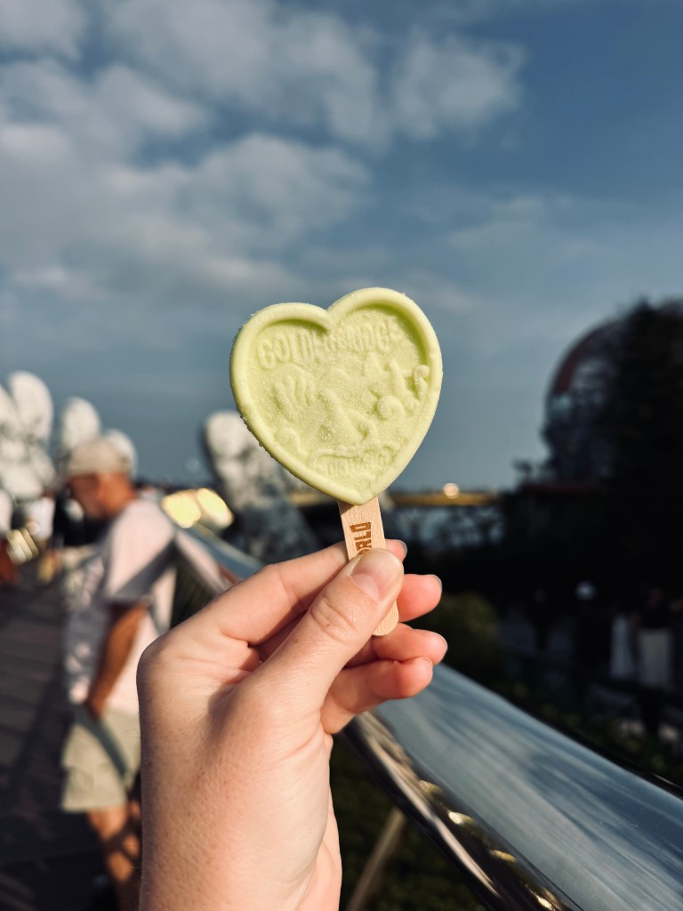 Green ice cream at Golden Bridge giant hands at Ba Na Hills, Vietnam