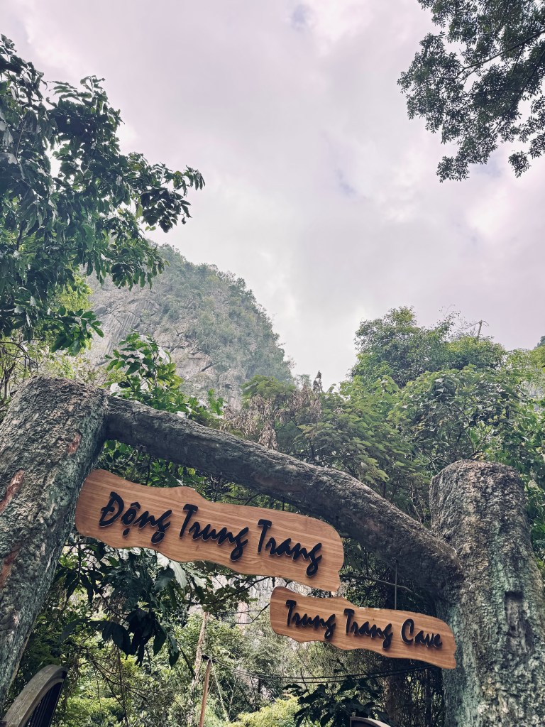 Entrance signs to Trung Trang Cave on a Halong Bay cruise, Vietnam