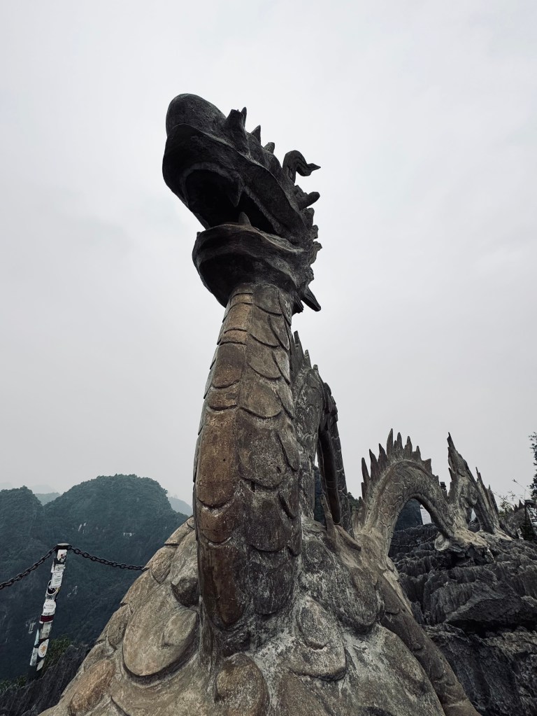 Dragon statue at the summit of Mua Cave in Ninh Binh, Vietnam