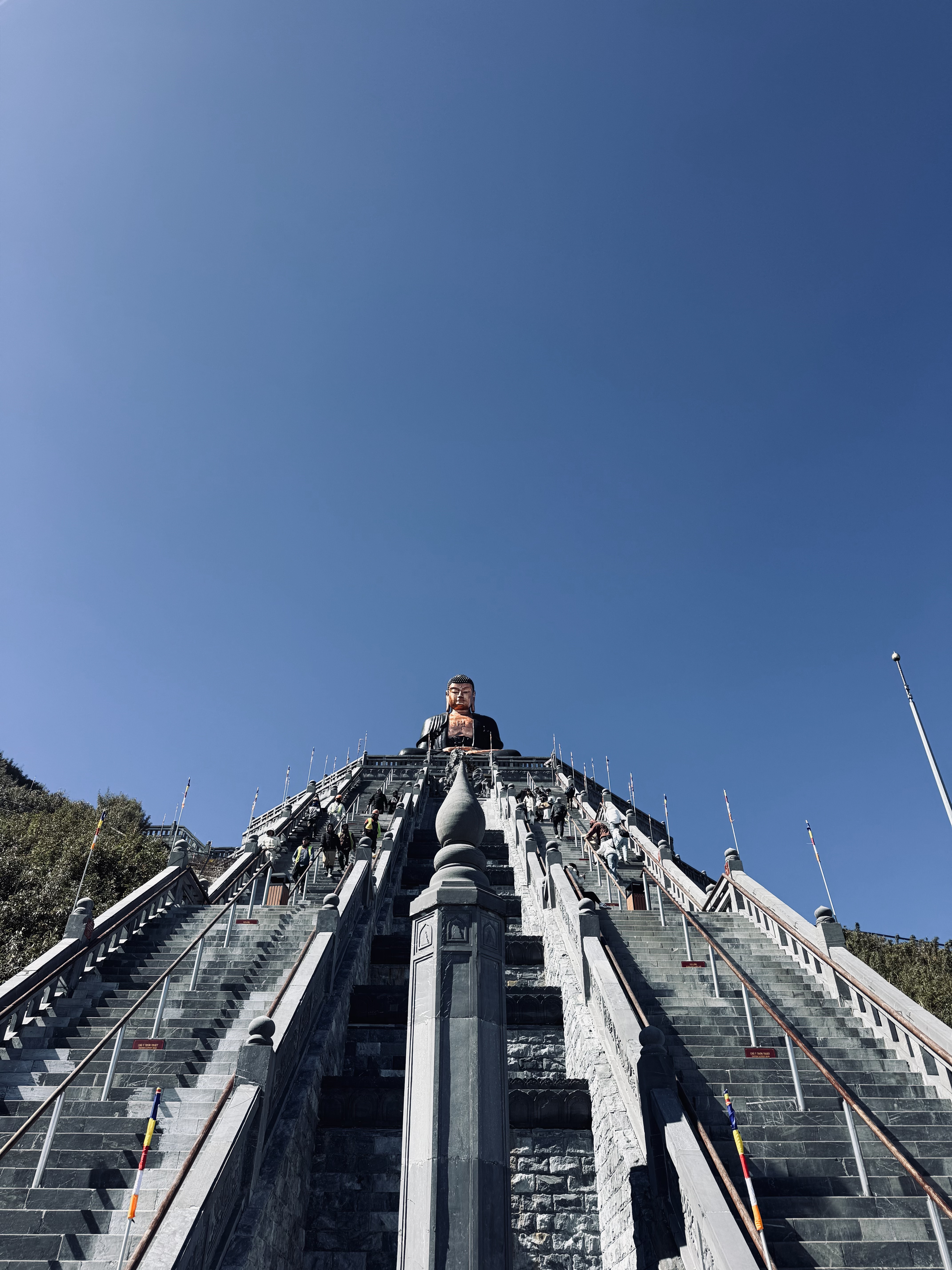 Big Buddha at the top of a big staircase at the top of Fansipan Mountain in Sapa, Vietnam