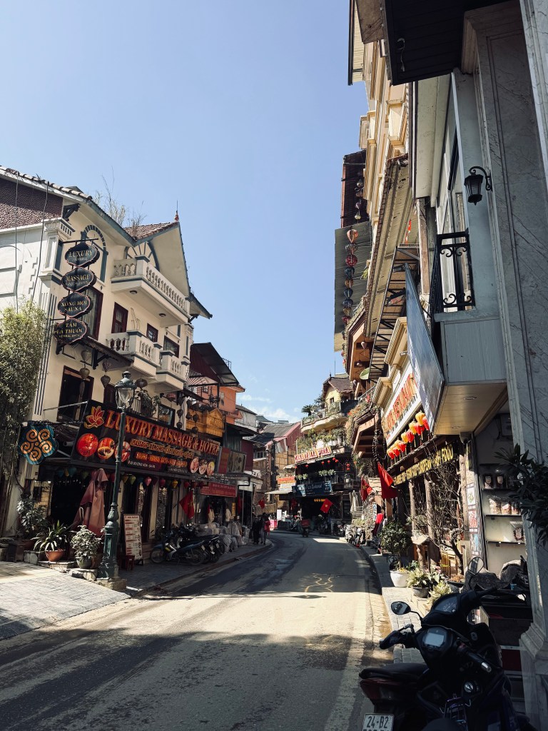 Street with shops and lanterns in Sapa, Vietnam